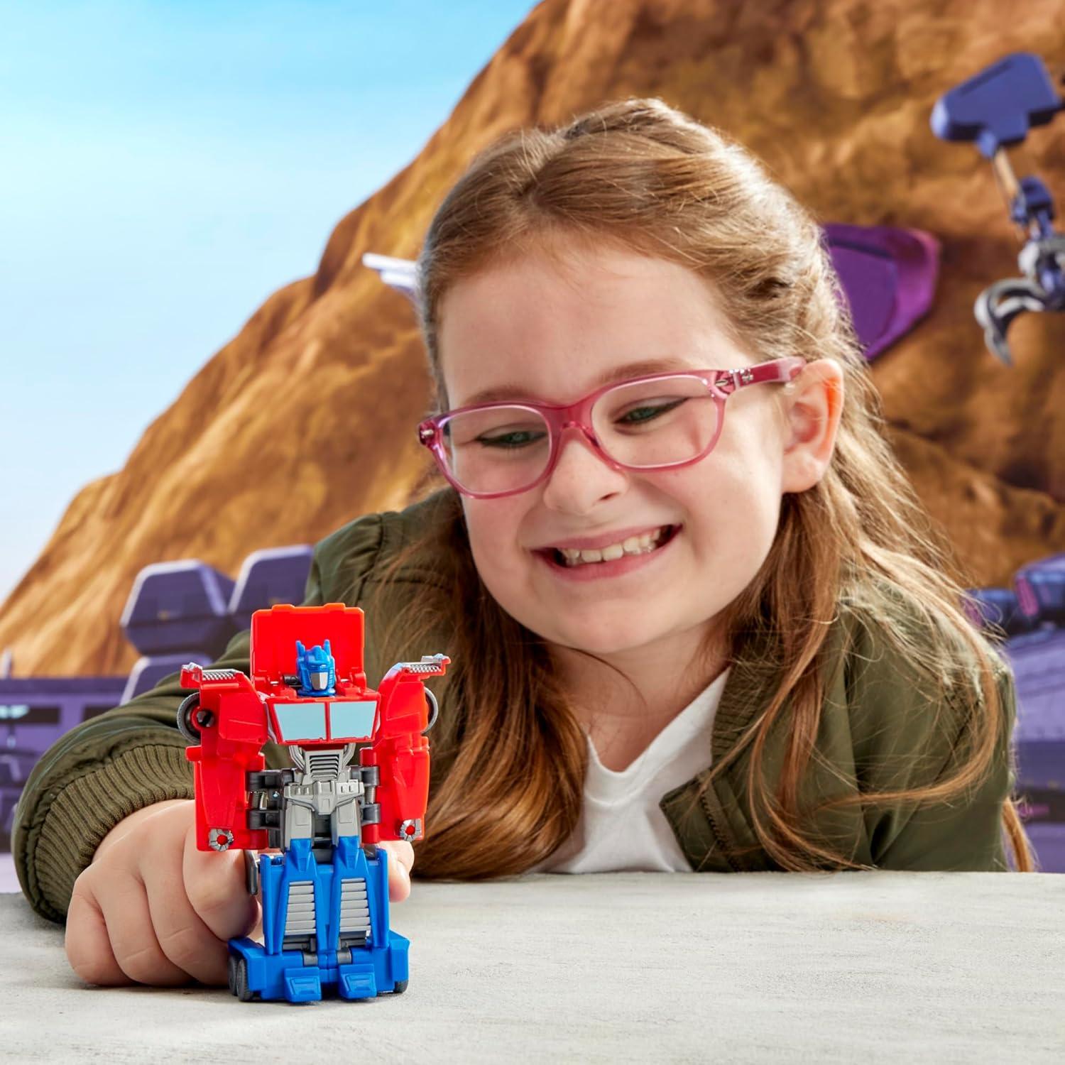 imageTRANSFORMERS EarthSpark 1Step Smash Changers Optimus Prime 4Inch Action Figure Robot Toys for Boys and Girls 6 and Up