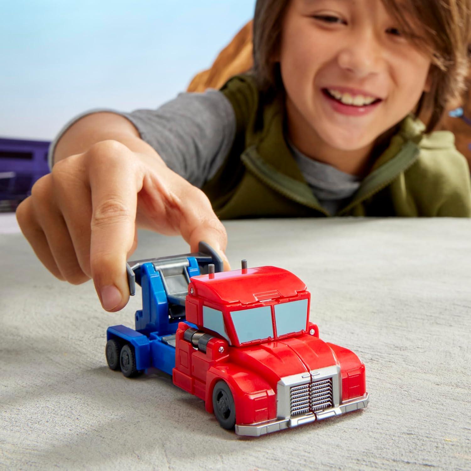 imageTRANSFORMERS EarthSpark 1Step Smash Changers Optimus Prime 4Inch Action Figure Robot Toys for Boys and Girls 6 and Up