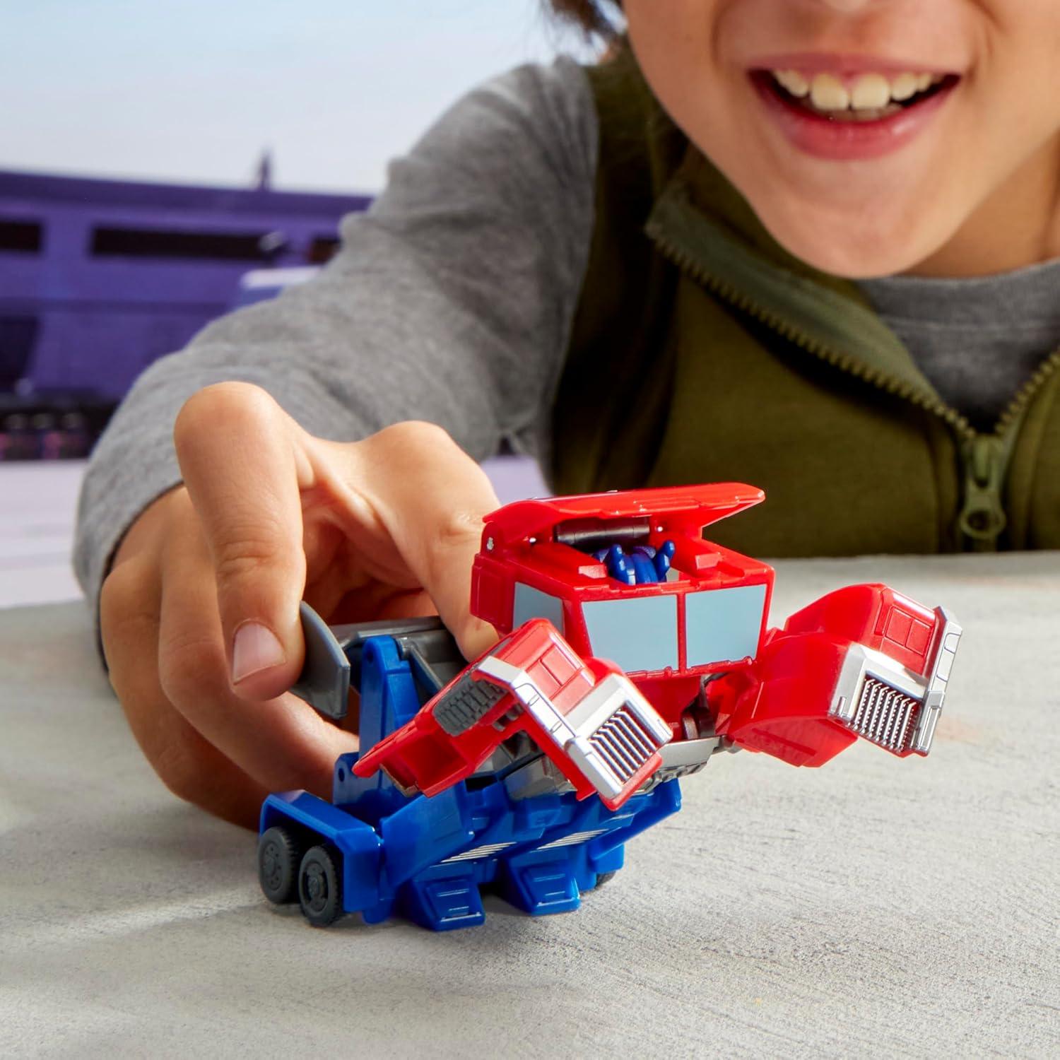 imageTRANSFORMERS EarthSpark 1Step Smash Changers Optimus Prime 4Inch Action Figure Robot Toys for Boys and Girls 6 and Up