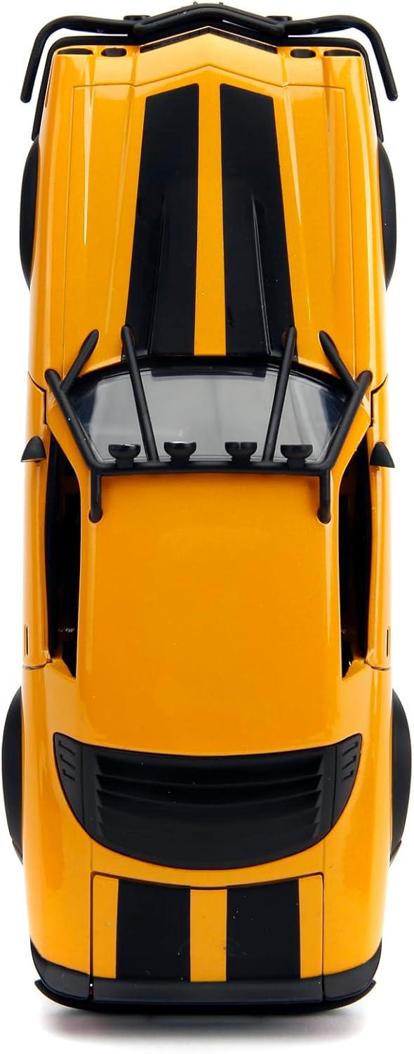 image:imageJada Transformers Rise of The Beast 124 1977 Chevy Camaro Bumblebee amp Badge DieCast Car Toys for Kids and Adults
